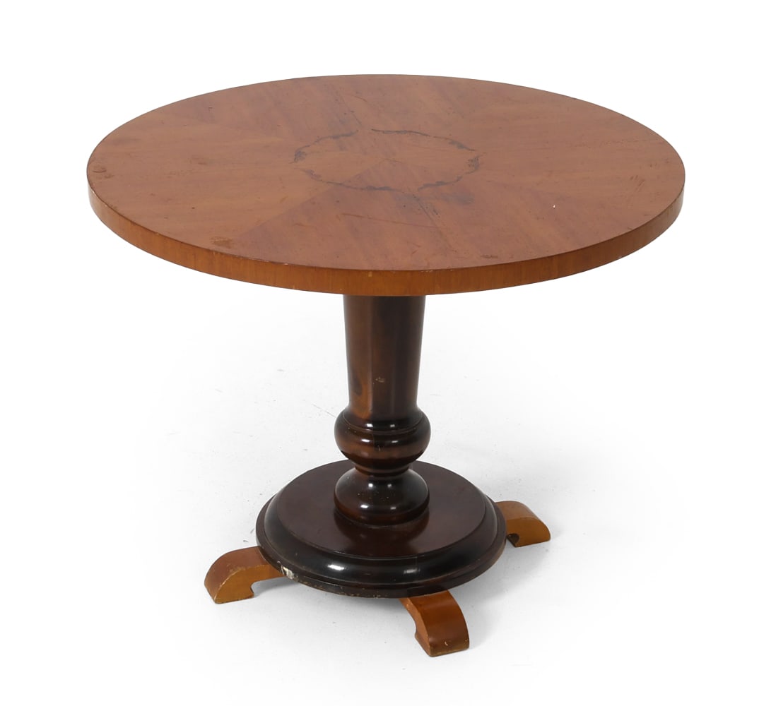 SWEDISH ART DECO WALNUT SIDE TABLE C. 1920S: Round center table with walnut veneer top and inlaid central motif, raised on a turned pedestal over a circular base with four scrolled feet. Sweden, circa 1920s. Dimensions: Height 23.5" x Diameter 3