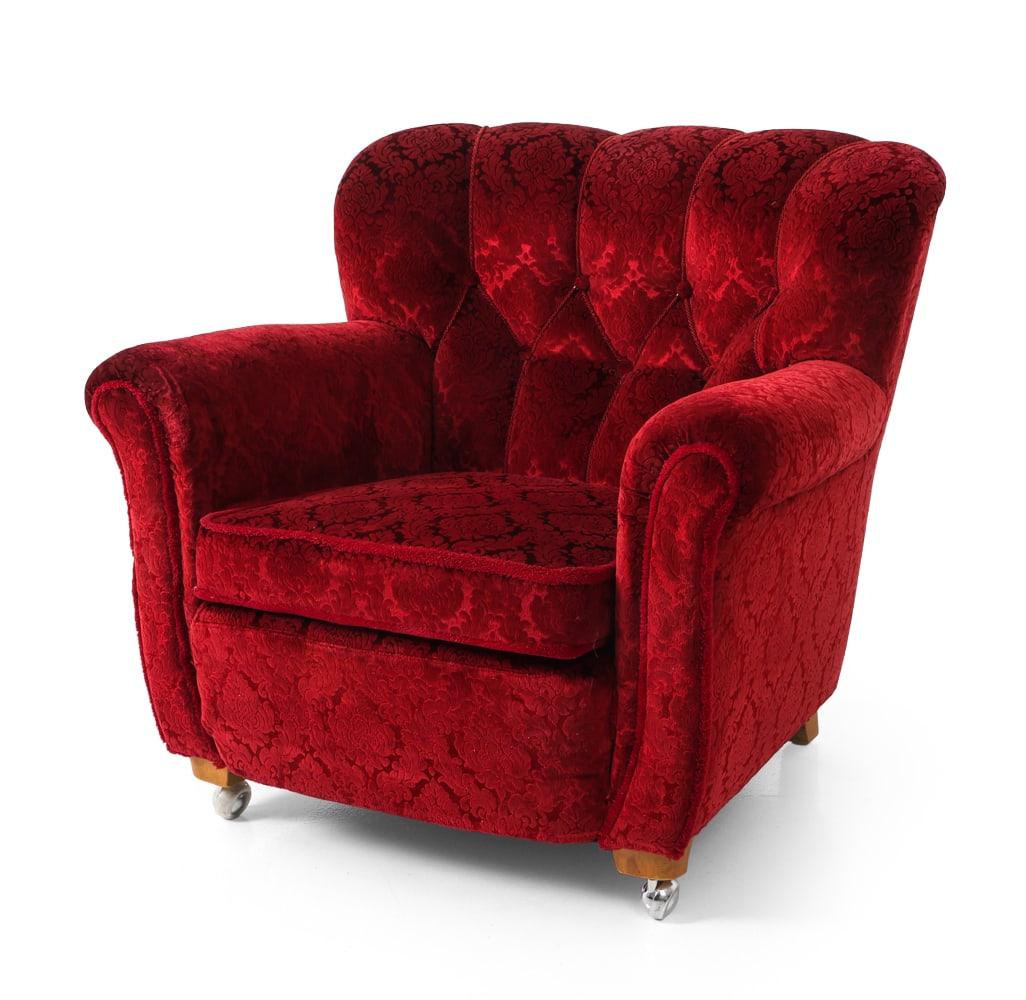 SCANDINAVIAN LOUNGE CHAIR: Lounge chair with a damask pattern upholstery. With two front casters. Dimensions: H 30" x W 35" x D 35" x SH 17" Condition: Light scuffs and nicks to feet. Light fading to fabric. Wear consistent wit