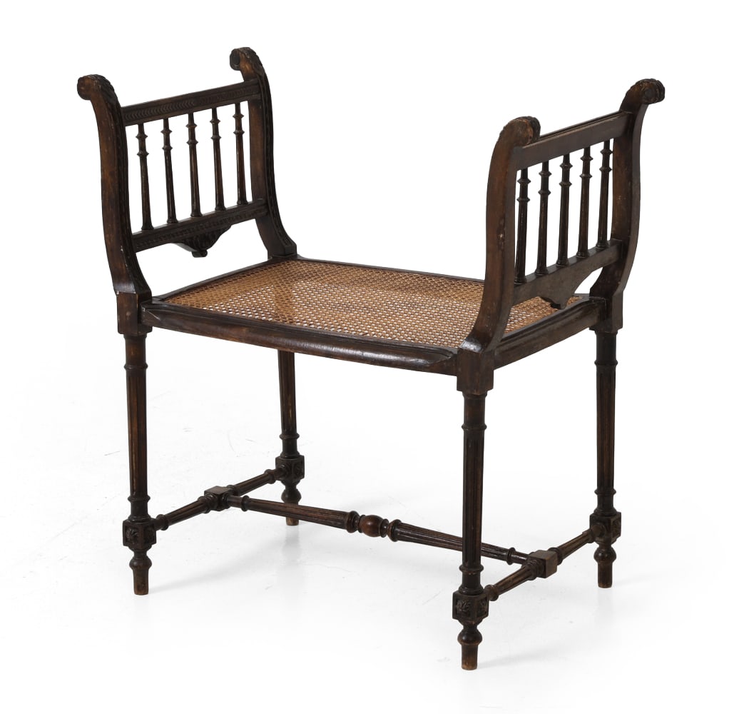 ANTIQUE SWEDISH CARVED AND CANED BENCH: Dimensions: H 27.5" x W 26.75" x D 14.25" x SH 15.75" Condition: Light fading to finish. scuffs to frame. Wear consistent with age and use.