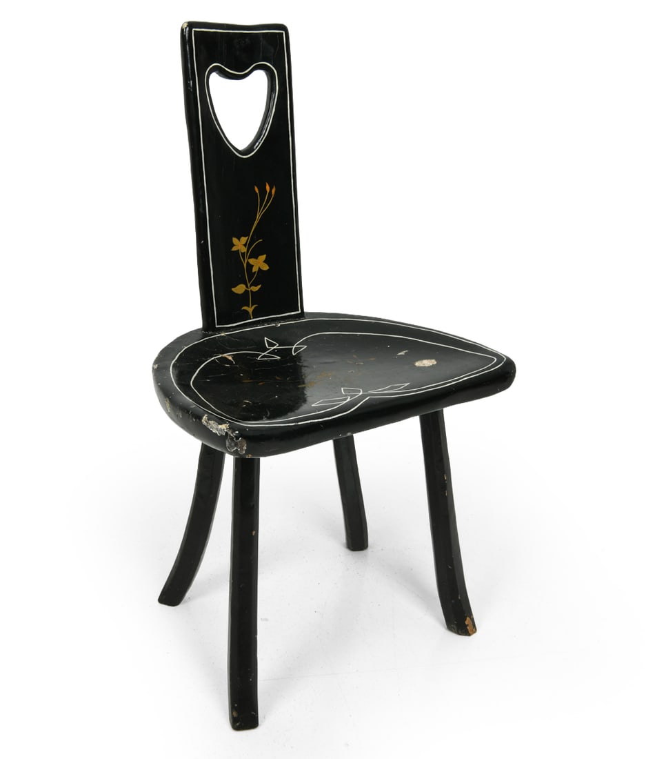 ANTIQUE SWEDISH FOLK ART PAINTED CHAIR: Antique black painted chair in three-legged design and a high-back silhouette in the Allmoge style (a Swedish term for folk art or vernacular craft). Floral motifs and heart-shaped cutout to the