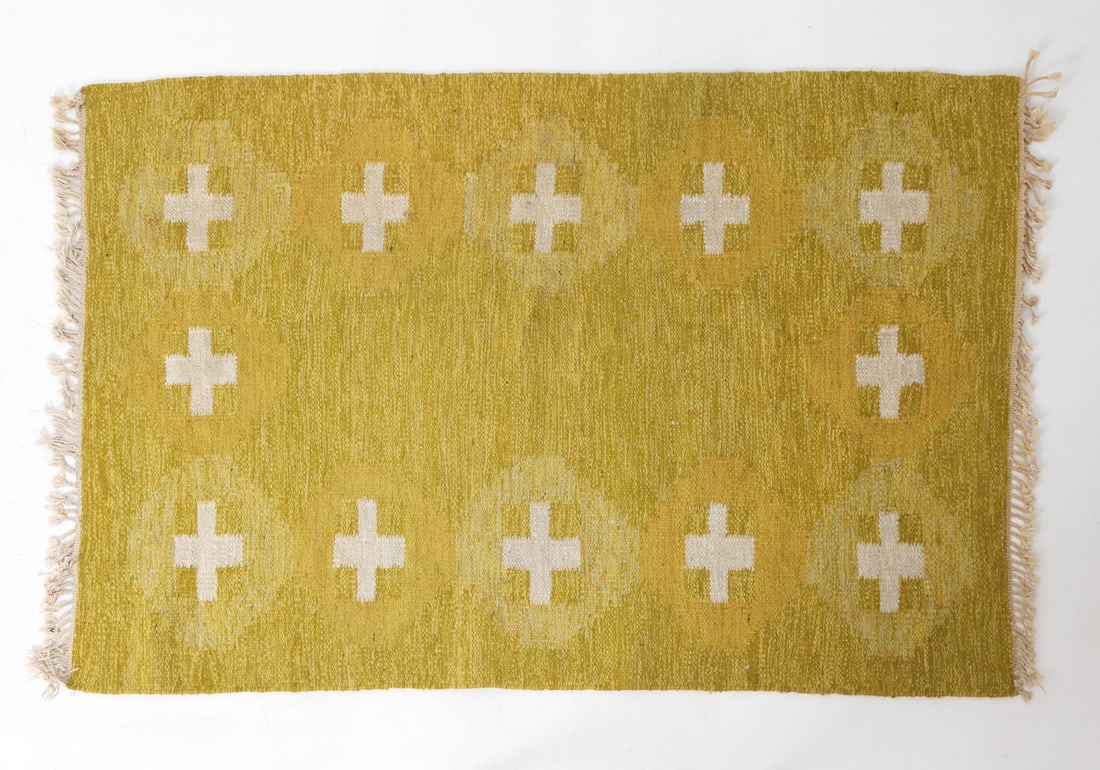 SWEDISH FLATWEAVE KILIM RUG: Geometric pattern rug featuring bright yellows. Apparently unmarked. Dimensions: H 82" x W 53.5" Condition: Wear consistent with age and use including slight discoloration and spots of soiling.