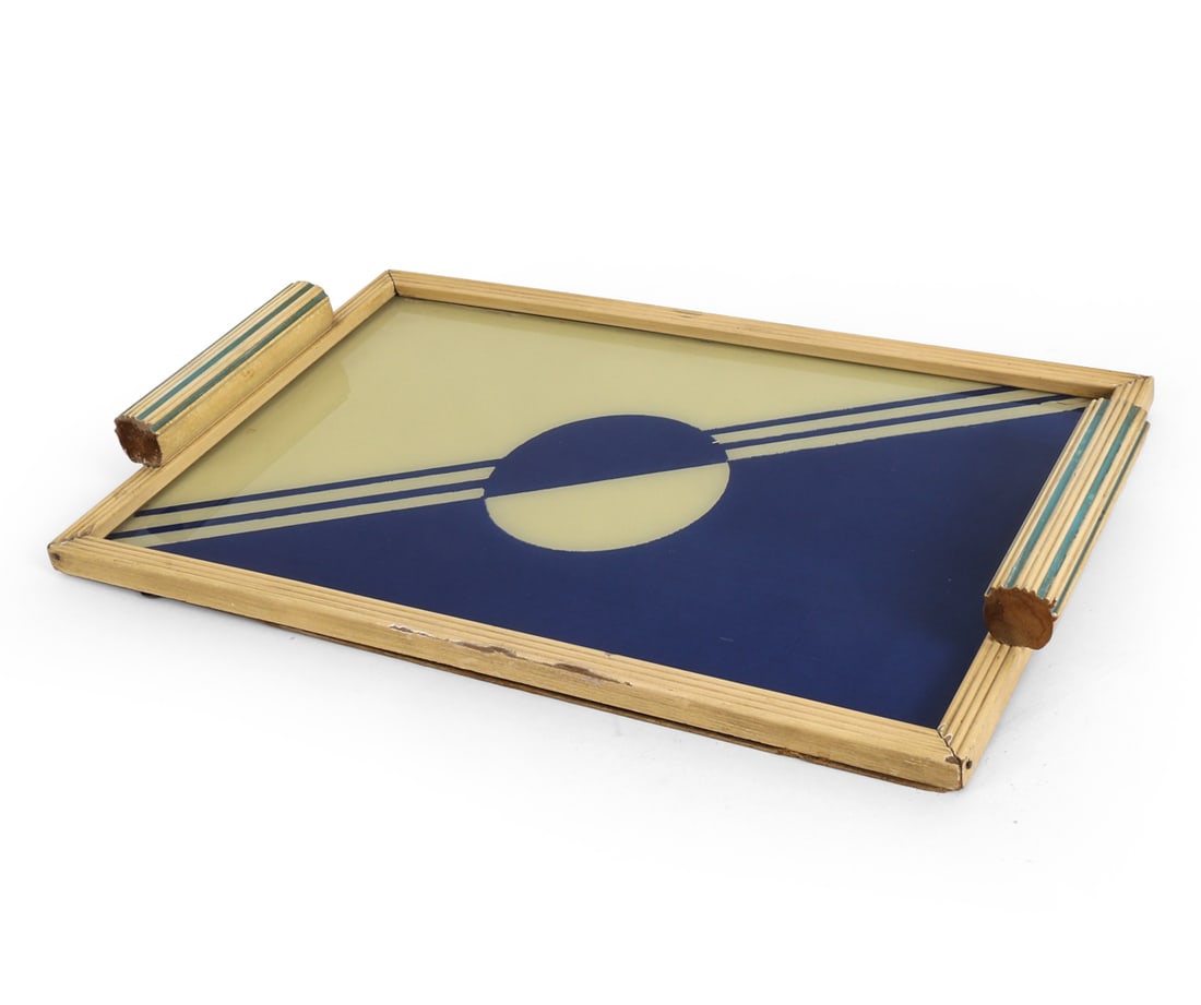 ART DECO SERVING TRAY CIRCA 1930'S: Art Deco style tray with graphic beneath glass and painted frame. Circa 1930's. Dimensions: H 2" x W 19.25" x D 11.75" Condition: Wear consistent with age and use. Frame is loose. Nicks, rubs, dings t