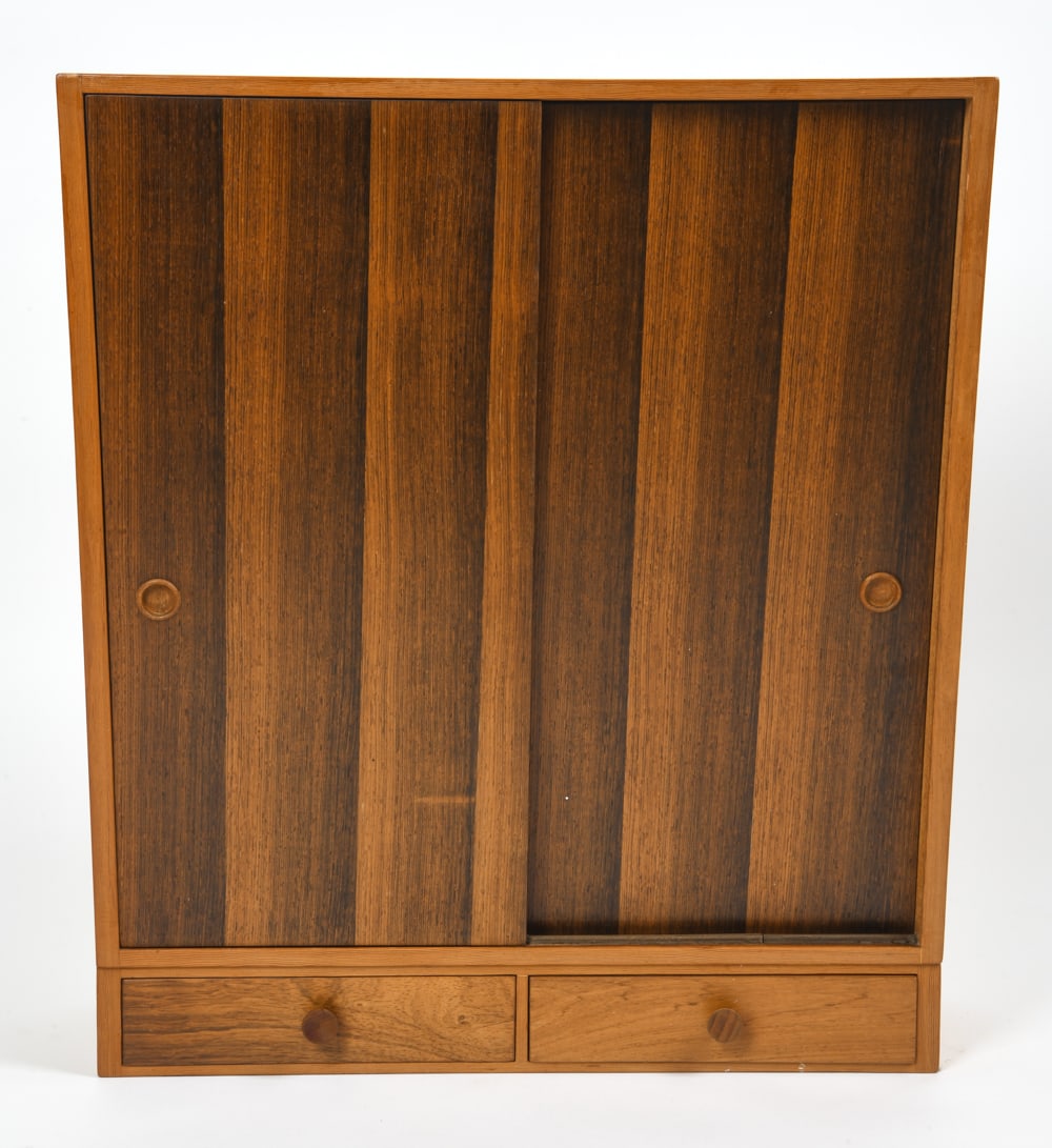 VEDEX DANISH SLIDING DOOR CABINET WITH DRAWERS: Beech cabinet with two sliding doors and four adjustable shelves by Vedex Mobelfabrik. Factory stamp "VEDEX" on the backside. Denmark, circa. 1960s. Dimensions: H 32" x W 27.5" x D 11.75" Condition: