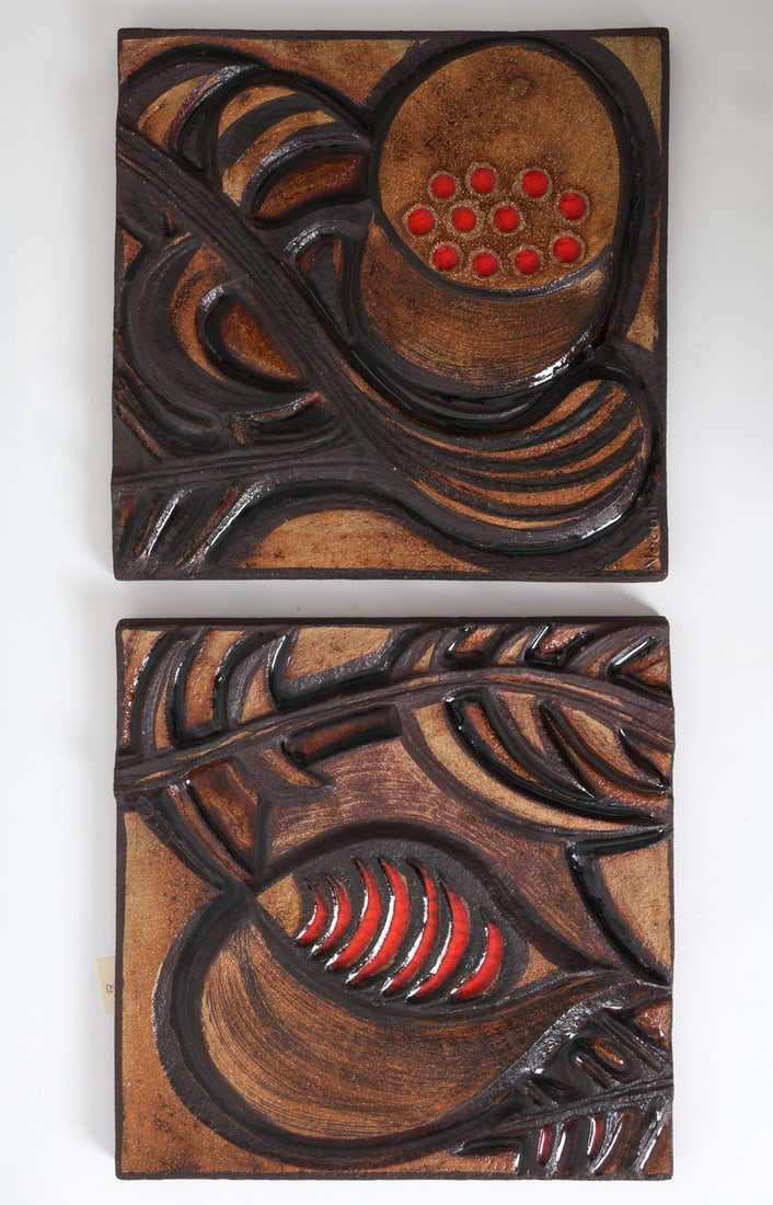 (2) NOOMI BACKHAUSEN FOR SOHOLM CERAMICS: Chamotte stoneware with botanical and abstract motifs in earthy tones. Marked "NOOMI" to front and "Soholm" to back. Denmark. circa 1960s. Dimension: H 13.5" x W 13.5" Condition: Wear consistent with
