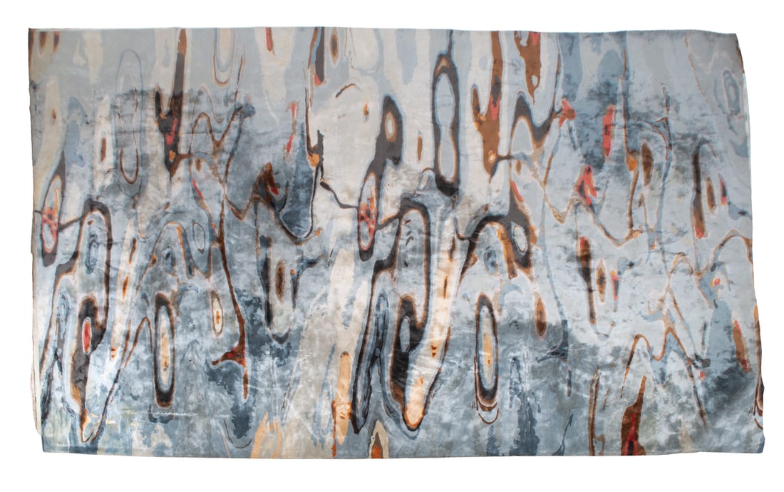 LARGE ABSTRACT AREA RUG: Swirling patterns in a cool grey and white base, with tones of burnt orange, brown, and deep black/dark grey accents. Dimensions: L 150" x W 194" Condition: Some divots throughout. Wear consistent wit