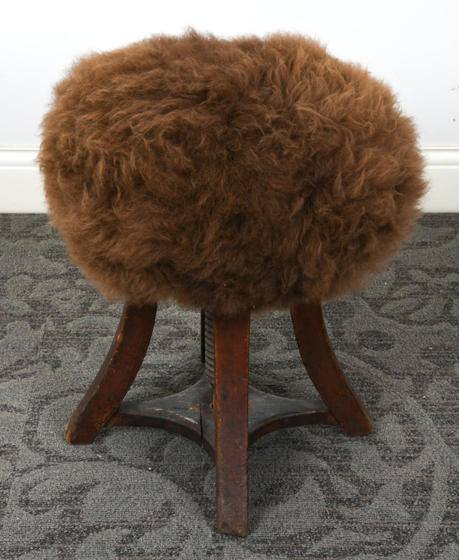 ANTIQUE SCANDINAVIAN LAMBS WOOL STOOL: Oak base with brown lambs wool upholstered swivel seat. Scandinavian, early 20th century. Dimensions: H 21.5" x Dia. 18.25". Condition: Minor losses to ends of feet. Scratches, dings, scuffs. Upholste