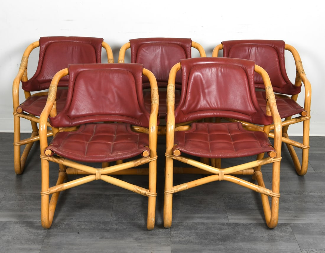 (5) SCANDINAVIAN BAMBOO & RATTAN ARMCHAIRS 1970S: Bamboo & rattan frames with cognac leather upholstery. Scandinavian, circa 1970s. Dimensions: H 29" x W 22" x D 25" x SH 18". Condition: Scuffs and rubs to leather. Scratches to frames. Wear
