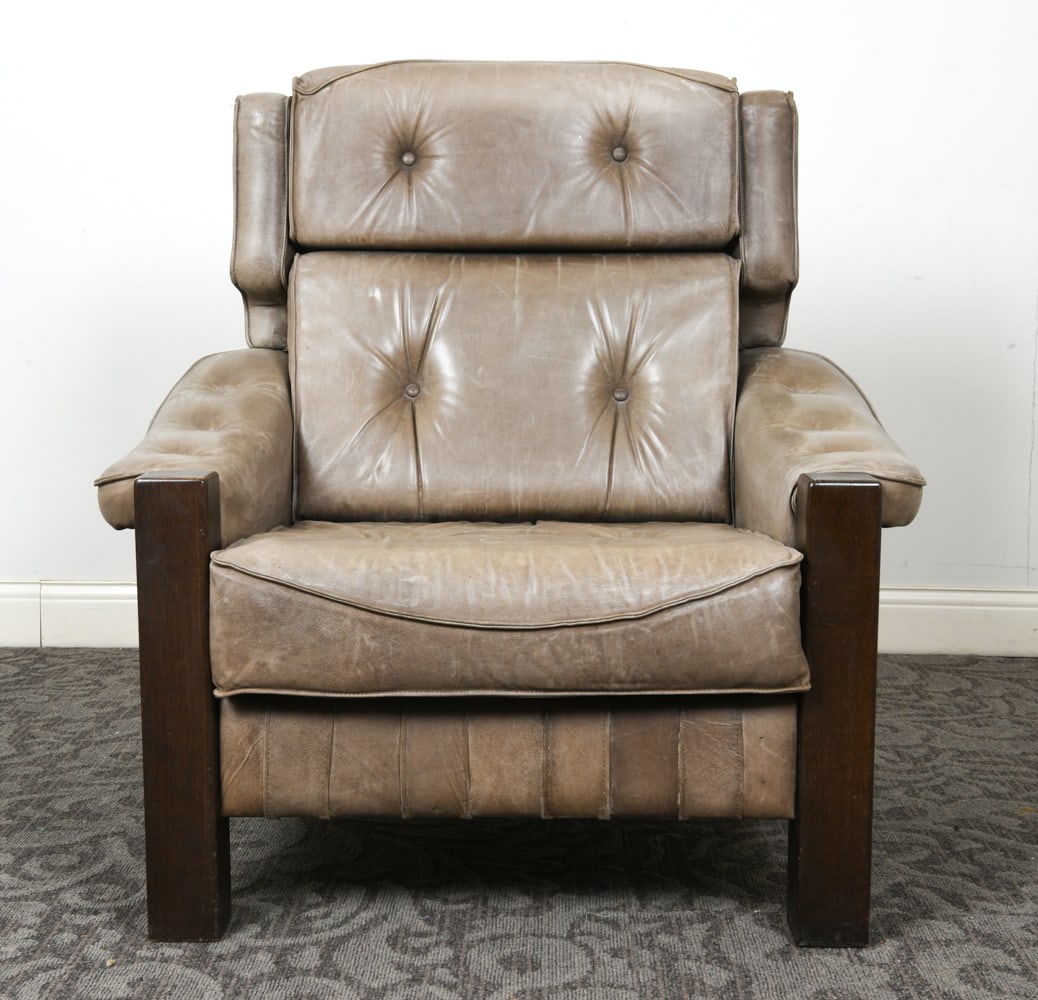 BRUTALIST SCANDINAVIAN PINE & LEATHER LOUNGE CHAIR: Pine frame in dark stain with olive toned tufted leather upholstery. Scandinavian, circa 1960s. Dimensions: H 42" x W 37.5" x D 36" x SH 17.5". Condition: Scuffs and scratches to leather. Marks and