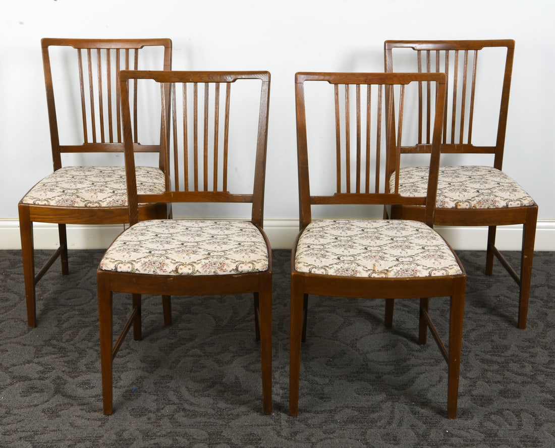 (4) SCANDINAVIAN TEAK DINING CHAIRS C. 1970S: Stamped indistinctly under seats. Teak banister back frames with floral patterned fabric seats. Seats are removable. Scandinavian, circa 1970s. Dimensions: H 35" x W 19" x D 17.25" x SH 18".