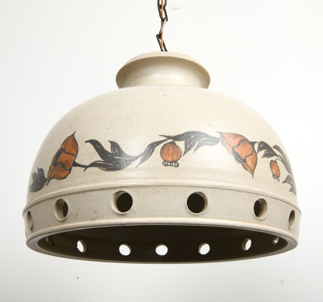 DANISH CERAMIC PENDANT LIGHT C. 1970S: Ceramic pendant light with painted decoration and holes cut out to edge. Denmark, circa 1970s. Dimensions: H 10" x Dia. 11.5". Chain L 35". Condition: Wiring untested. Faint scuffs to ceramic. Rubs