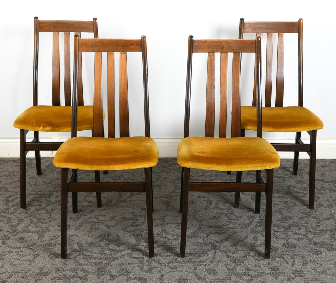 (4) FARSTRUP DANISH DINING CHAIRS: Gold-tone velour seats, by Farstrup Mobelfabrik. Tagged underneath. Denmark, circa 1960's. Dimensions: H 36.5" x W 17" x D 21" x SH 18" Condition: Wear consistent with age and use. Scuffs, rubs,