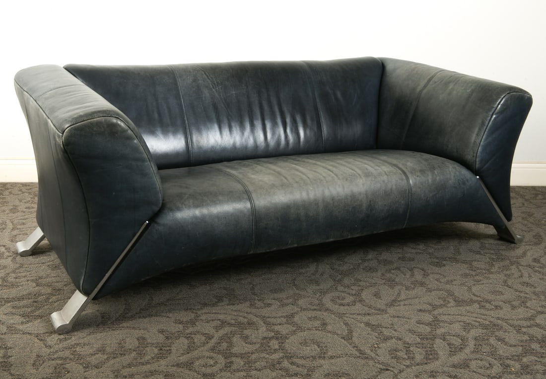 ROLF BENZ DANISH LEATHER SOFA C. 1970S: Designed by Anita Schmidt. Model 322. Dark green leather upholstery with chrome aluminum feet. Apparently untagged. Denmark, circa 1970s. Dimensions: H 28" x W 75" x D 33" x SH 13.5". Condition: