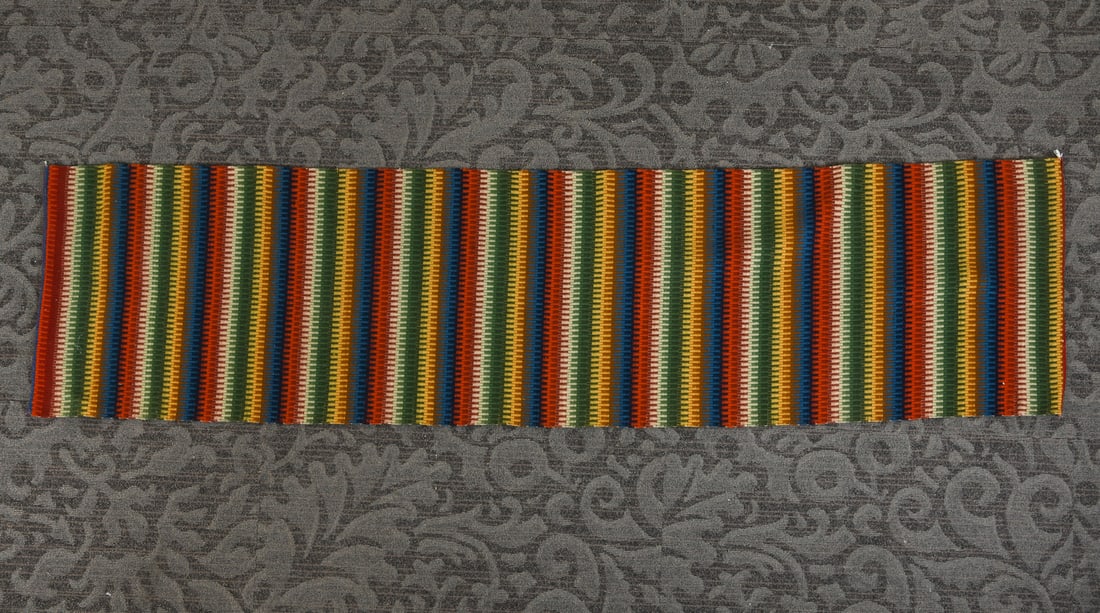 DANISH WOOL RUG CIRCA 1950S: Danish, circa 1950's. Dimensions: H 102" x W 26" Condition: Wear consistent with age and use. Minor fading, rubs to edges.