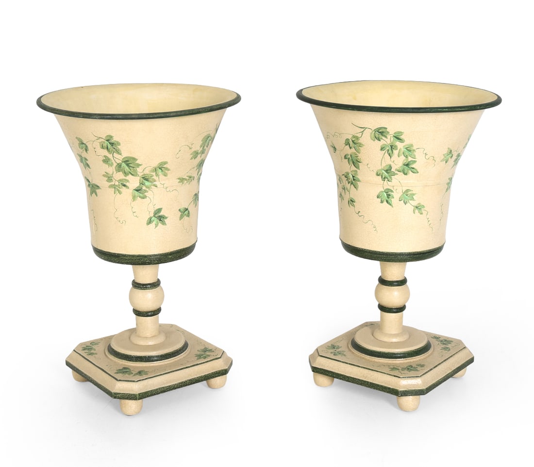 VINTAGE PAIR OF TOLE METAL JARDINIERES: Painted metal jardinieres with tray. Features green ivy motif. Dimensions: H 25" x Dia 17" Condition: Wear consistent with age and use. Some soiling, minor rubs, scuffs.