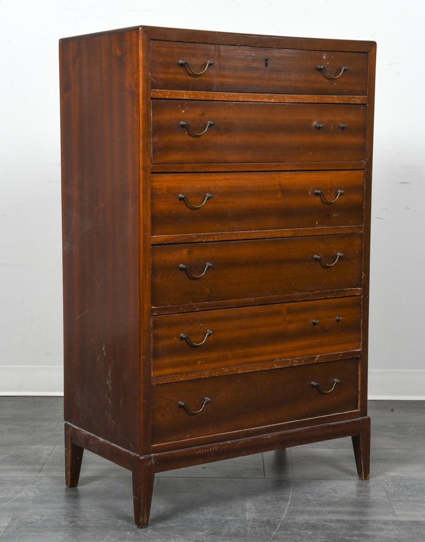 SCANDINAVIAN MAHOGANY CHEST OF DRAWERS: Mahogany chest of drawers with brass pulls. Scandinavian, circa 1970s. Dimensions: H 45" x W 28" x D 16". Condition: Scuffs and scratches, wear consistent with age and use.