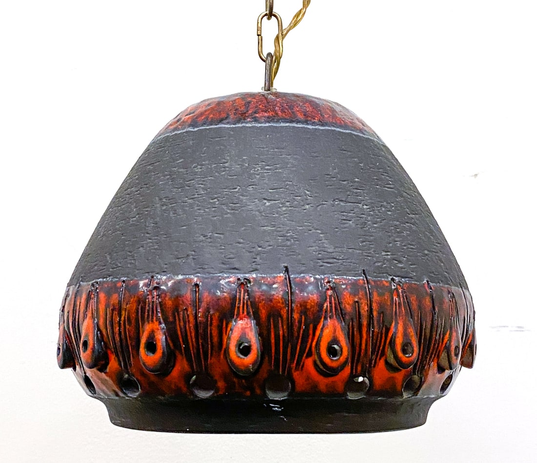 DANISH CERAMIC PENDANT LIGHT C. 1970S: Ceramic pendant light with red glazed accent. Holes to top and sides to release light. Denmark, circa 1970s. Dimensions: H 8" x Dia. 9.25". Chain L 50". Condition: Wiring untested. Few faint scuffs. W