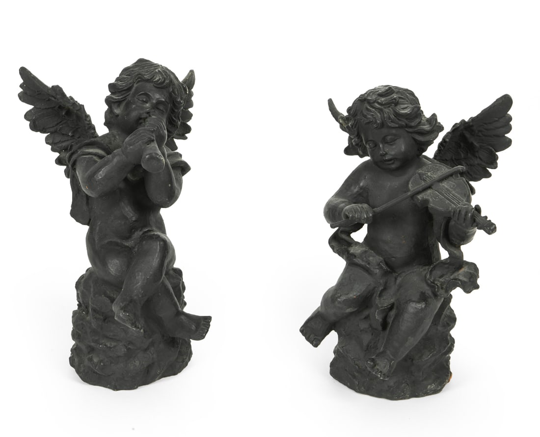 DECORATIVE CAST IRON ANGEL STATUES: Cast iron musical cherub statues in a duet featuring one cherub playing a trumpet and the other a violin. 20th century. Dimensions: Tallest H 14.25" x Dia. 8.75". Condition: Scuffs and scratches, smal