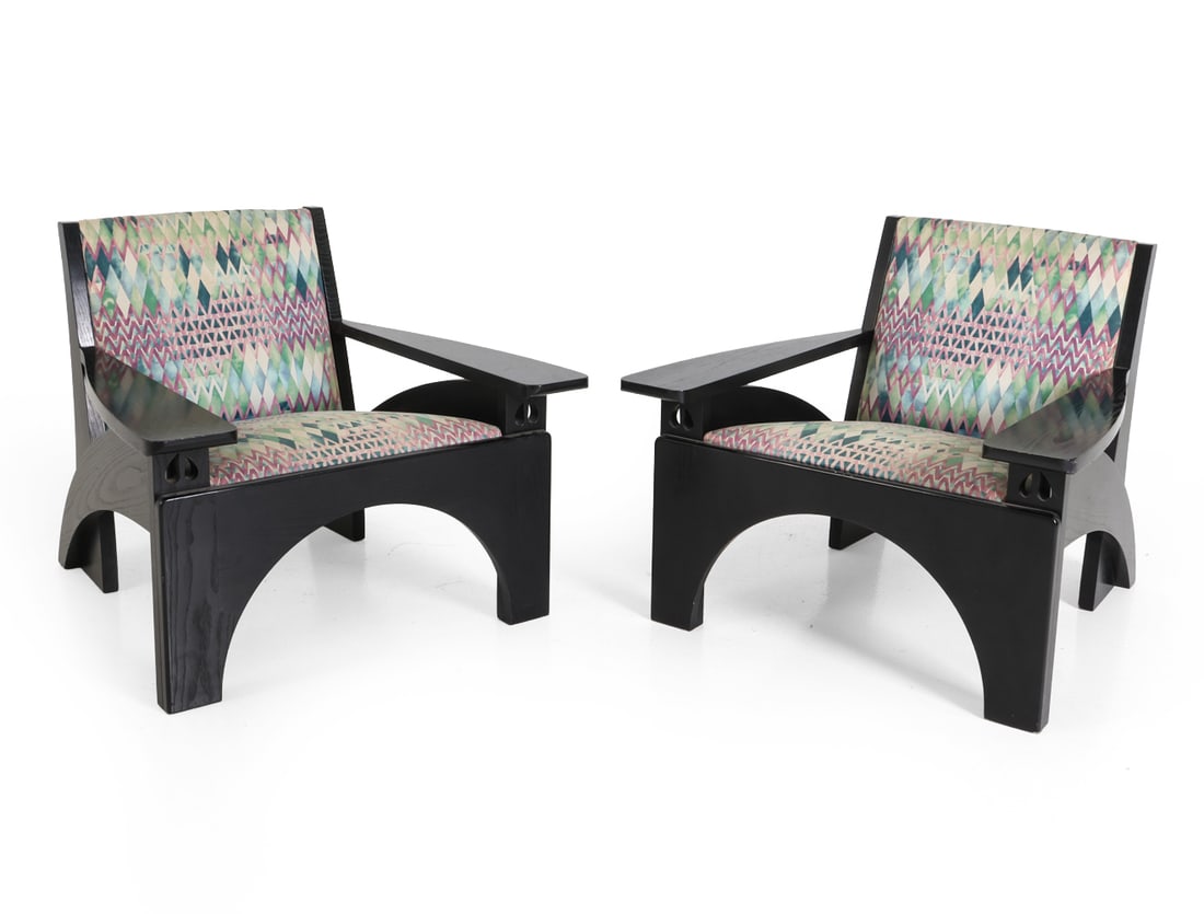 PAIR C. R. MACKINTOSH FOR CASSINA LOUNGE CHAIRS: Limited edition from the "Hill House Set". Two armchairs designed by Charles Rennie Mackintosh for Cassina. Ebonized oak frames with abstract patterned upholstery. Tagged underneath frames. Italy, 20t
