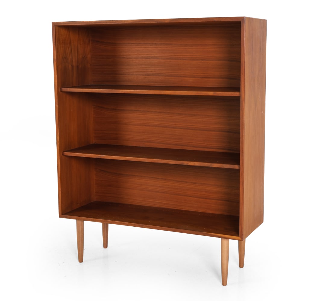 ATTR. HELTBORG DANISH TEAK BOOKCASE C. 1960S: Adjustable shelves. Marked on back top corner. Denmark, circa 1960s. Dimensions: H 44.25" x W 35.5" x D 12". Condition: Fading and discolored spots to top. Light scratches. Wear consistent with age an