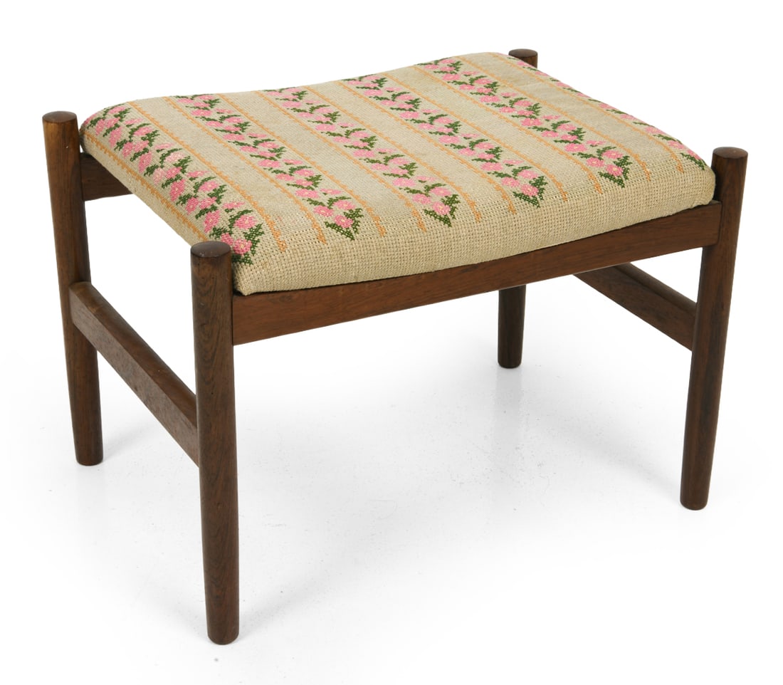 SCANDINAVIAN TEAK OTTOMAN C. 1960S: Features flower-motif upholstery and teak frame. Scandinavian, circa 1960's. Dimensions: H 14" x W 21" x D 15" Condition: Wear consistent with age and use. Nicks, scuffs to wood. Minor discoloration s
