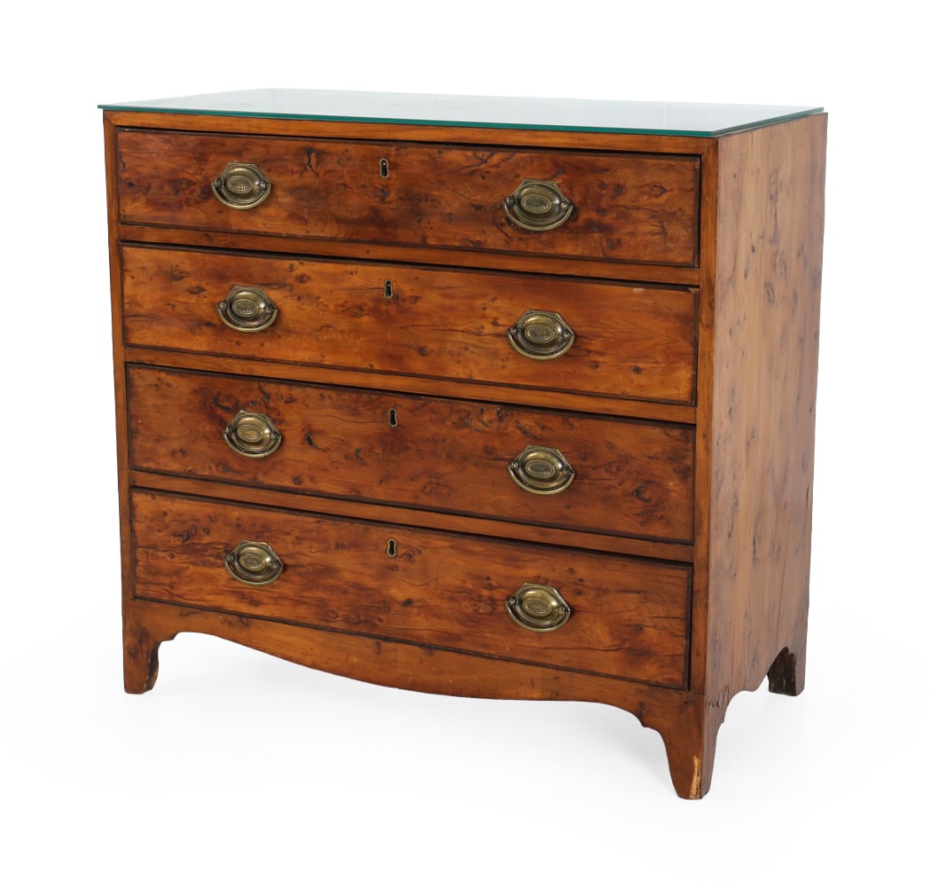 ANTIQUE ENGLISH BURL WALNUT CHEST OF DRAWERS: Chest of four dovetailed drawers with brass pulls and centered keyholes. Curved apron with flared bracket feet. Includes a glass top. Late 18th century. Dimensions: H 31.25" x W 33" x D 16.25". Condit