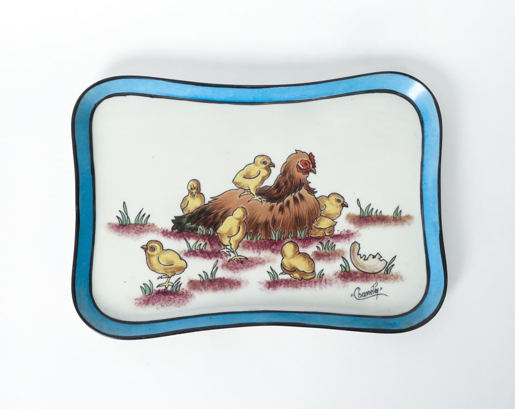 JACQUES TIELES FRENCH PORCELAIN TRAY W CHICKENS: Marked underneath. Porcelain ceramic tray with depiction of a hen and her chicks. France, late 19th or early 20th century. Dimensions: H .75" x W 11.25" x D 8". Condition: Light surface marks. Wear co