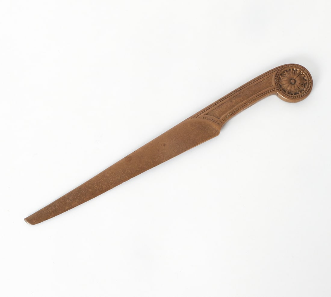 TIFFANY STUDIOS BRONZE LETTER OPENER: Marked to side. Art Nouveau letter opener in Adams design. Early 20th c. Dimensions: L 9.5" x W .25". Condition: Light overall wear to finish. Patina, Wear consistent with age and use as displayed.