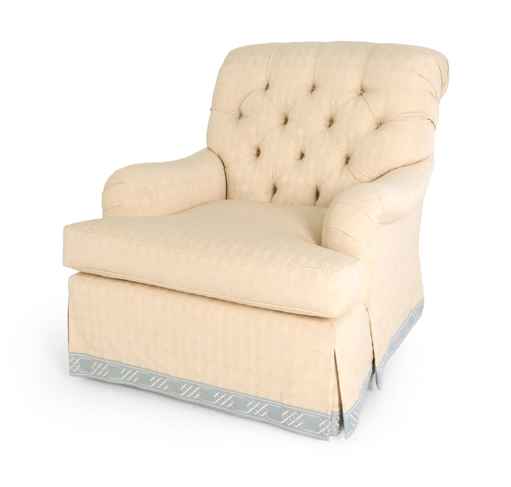 TUFTED SWIVEL LOUNGE CHAIR: Lounge chair in Ivory with needlework floral pattern upholstery. Button tufted back and subtly flared arms. 20th century. Dimensions: H 34.5" x W 34" x D 42" x SH 17.75". Condition: Few faint spots of