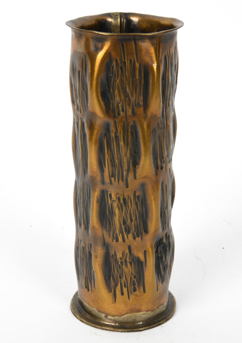 BRUTALIST COPPER SCULPTURAL GERMAN VASE: Metal vase with brass tone metal body and copper tone base. Textured exterior with vertical relief patterns. 20th century. Dimensions: H 8" x Dia 3" (Base). Condition: Sharp metal protrusion to side. 