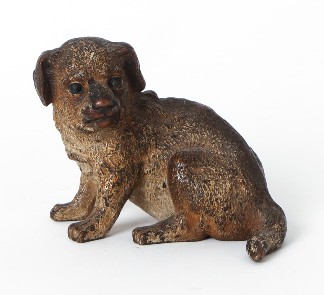 ANTIQUE ENGLISH COLD PAINTED BRONZE DOG FIGURINE: Marked underneath. Late 19th or early 20th century. Dimensions: H 3" x W 4" x D 3.5". Condition: Rubs and scuffs. Wear consistent with age and use as displayed.