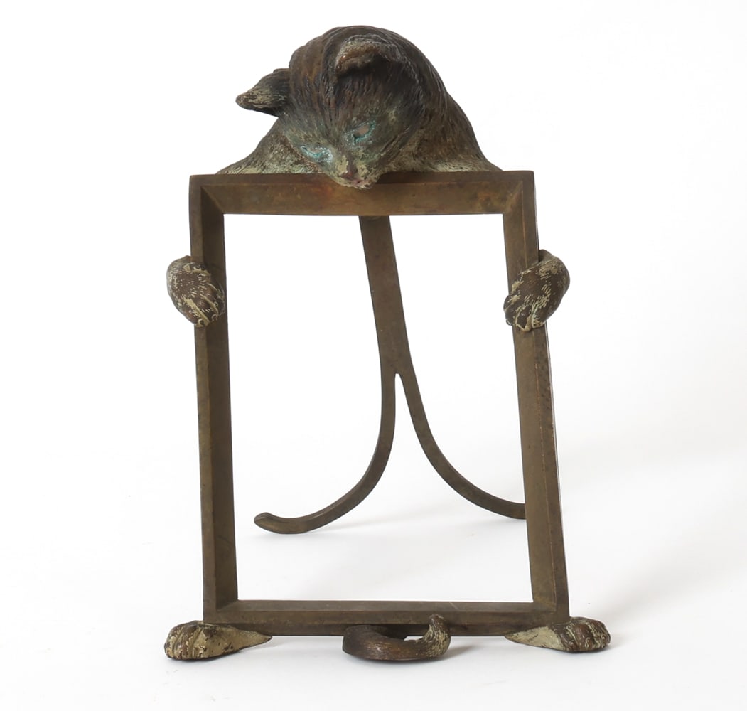 ANTIQUE AUSTRIAN VIENNA BRONZE CAT PICTURE FRAME: Bronze picture frame with cat head and paws. 19th century. Dimensions: H 10.25" x W 6.25" x D 3.5". Condition: Wear consistent with age and use including rubs and scuffs. Patina to brass. Corrosion ar