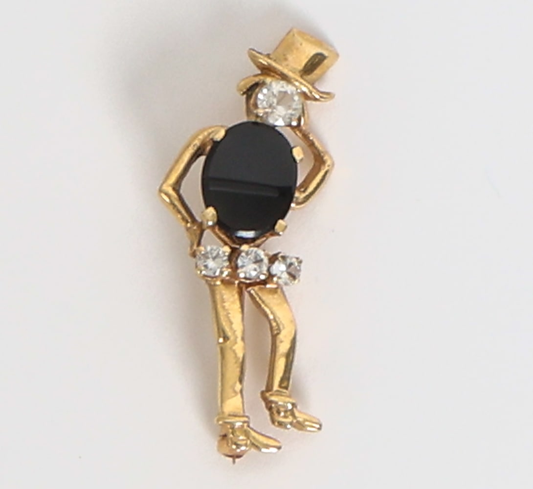 14K GOLD MR. PEANUT FIGURAL BROOCH: Gold brooch pin with black stone and quartz. Marked on back. Dimensions: H 1.5". Condition: Faint rubs. Wear consistent with age and use.