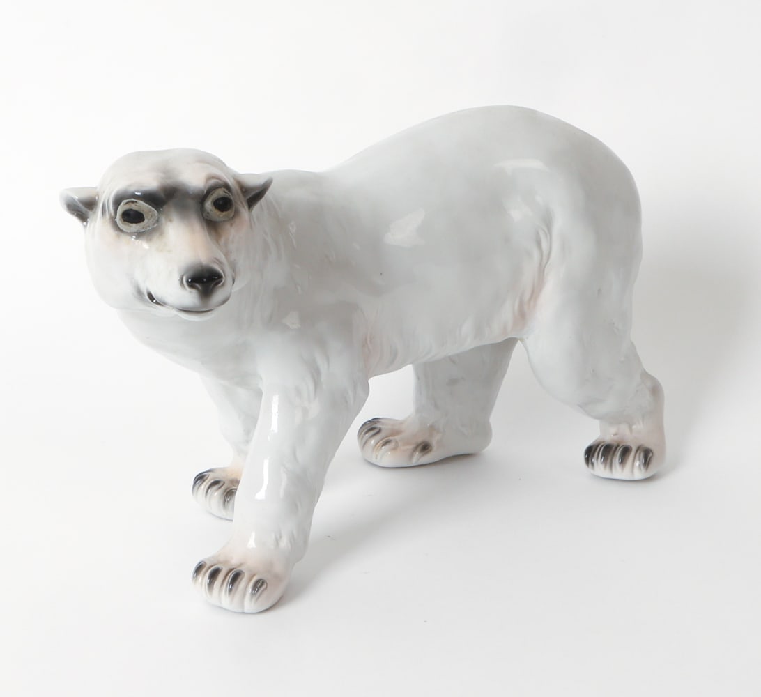 ERNST BOHNE SOHNE PORCELAIN POLAR BEAR FIGURE: Porcelain ceramic figure of a polar bear. Marked to bottom. Late 19th or early 20th century. Dimensions: H 9" x W 7" x D 14". Condition: Light surface marks. Wear consistent with age and use as displa