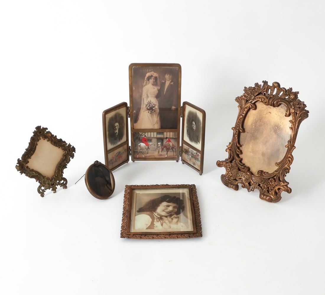 ANTIQUE VICTORIAN PHOTOS & BRASS FRAME GROUPING: Grouping of brass picture frames with few photographs and painted illustrations included. 19th century to early 20th century. Dimensions: Largest, tri-fold frame H 8.25" x W 9.5". Condition: Scuffs an