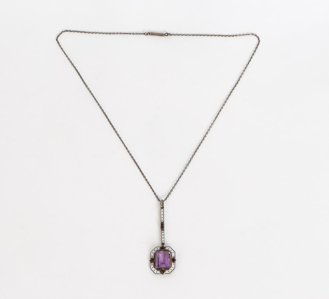 STERLING SILVER & AMETHYST NECKLACE: Sterling silver necklace amethyst stones. White enameled decoration. Marked to back of pendant. Dimensions: L 18.75". Pendant H 2". Condition: Light rubs and scuffs to silver. Small scuffs to stone. W