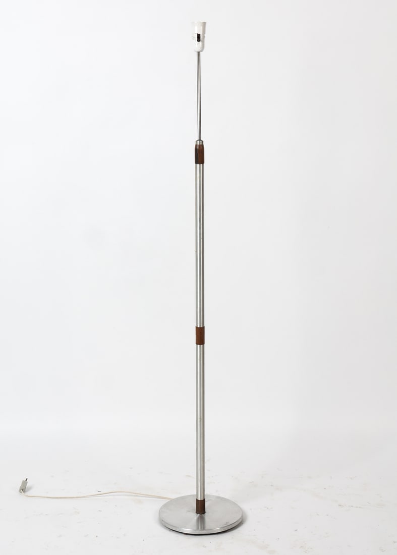 DANISH TEAK & ALUMINUM FLOOR LAMP C. 1960S: Floor lamp with teak and metal segments to stand. Denmark, circa 1960s. Dimensions: H 55.75" x Dia. 9.75". Condition: Not Tested. Socket is loose. Wear consistent with age and use.