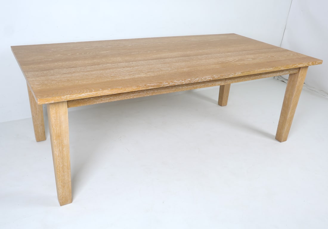 PIER 1 IMPORTS OAK DINING TABLE: Oak veneer dining table. Contemporary. Dimensions: H 30" x W 84" x D 42" Condition: Loss to one corner. Wear consistent with age and use. Some scuffs.
