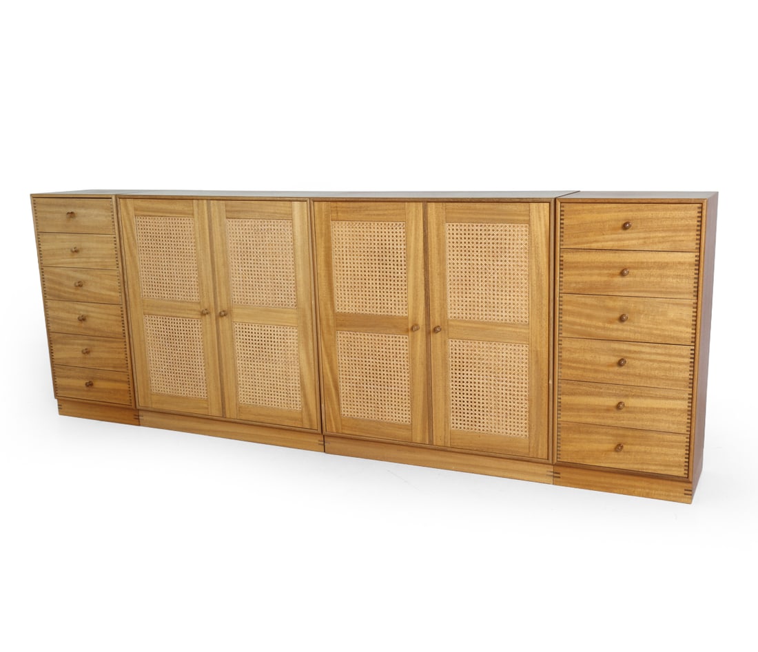ATTR. RASMUSSEN DANISH TEAK & CANE CABINETS: Two cabinets with woven cane inset doors and two chests of drawers with pulls. Finger-joint joinery on the plinth base and drawer units. Stamped "Made in Denmark" to back. circa 1960s. Dimensions: H