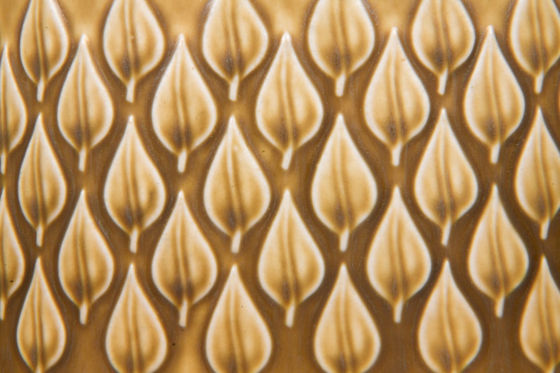 JENS QUISTGAARD RELIEF CERAMIC GROUPING - 10