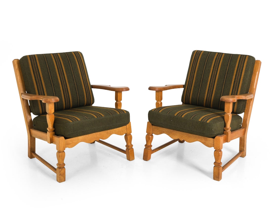 HENNING KJAERNULF DANISH OAK LOUNGE CHAIRS 1970S: Apparently unmarked. Denmark, circa 1970s. Dimensions: H 30" x W 27.5" x D 27" Condition: Fading and discoloration. Wear consistent with age and use. DA_115