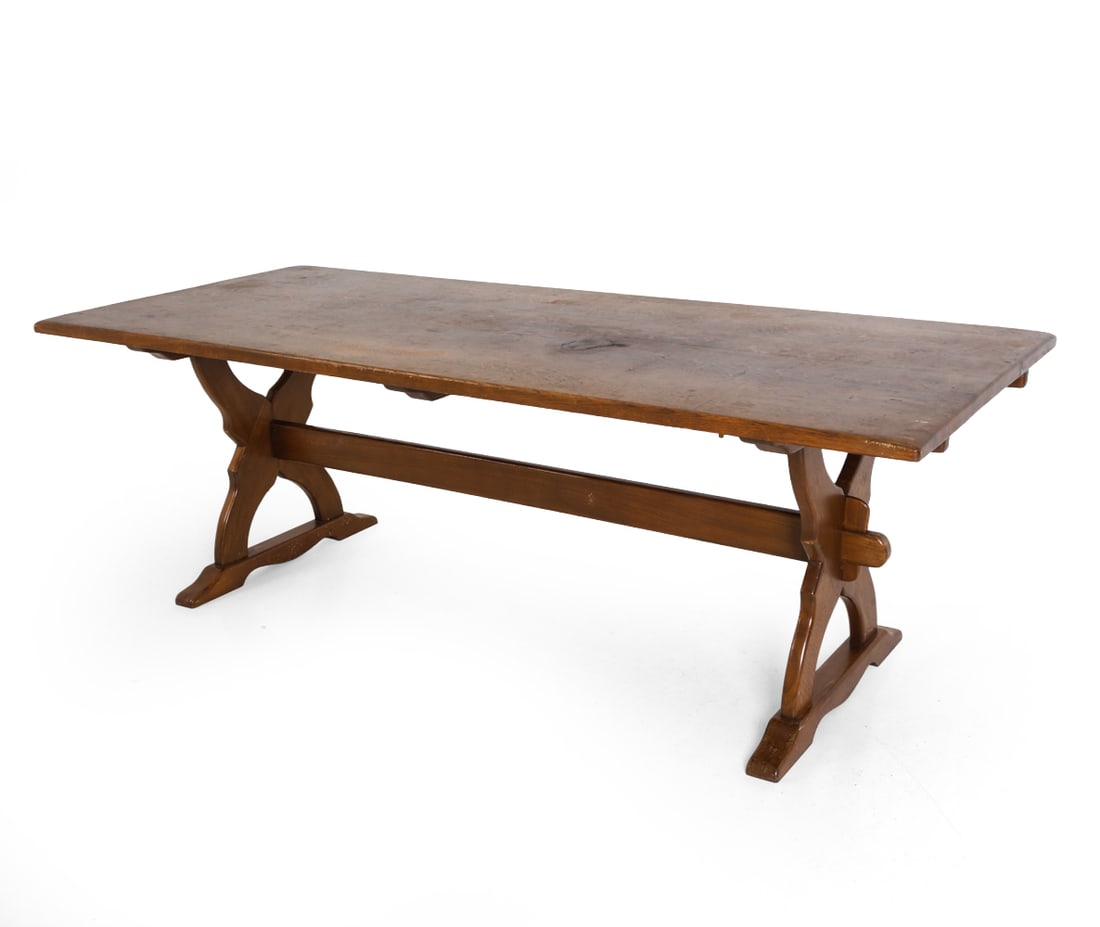 DANISH OAK EXPANDING DINING TABLE: (2) Leaves included. Oak dining table with cross shaped trestle base. Dimensions: H 29" x W 85.5" x D 35.5". Leaves W 26.5". Condition: Loss to corner of leaf. Water stains and discoloration. Wear con