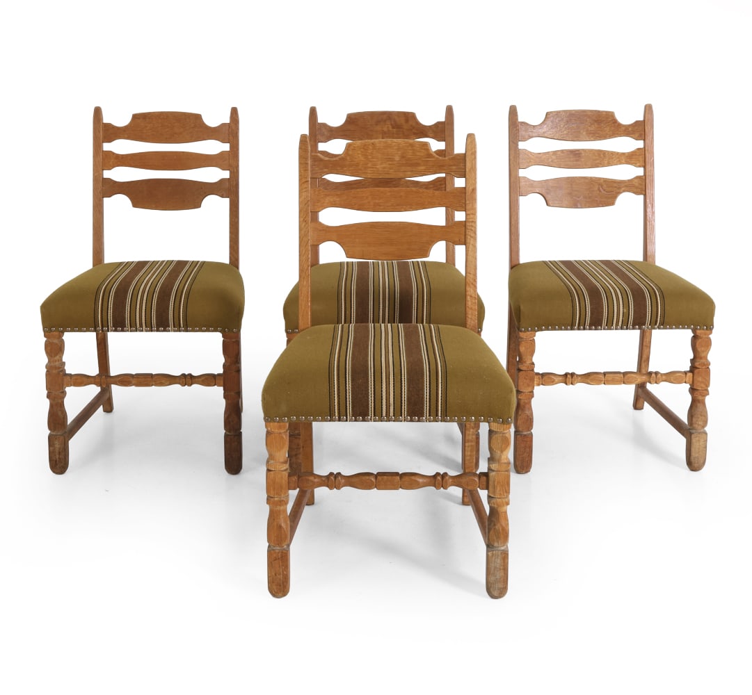 (4) STYLE OF KJAERNULF DANISH OAK DINING CHAIRS: Four oak dining chairs. Denmark, circa 1970s. Dimensions: H 34.5" x W 20" x D 19" x SH 18" Condition: Watermarks and discoloration to legs. Wear consistent with age and use. DA_139
