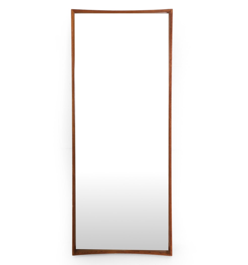 AB GLAS & TRA SWEDISH TEAK MIRROR C. 1960S: Label of maker and a date of Jan 10th 1963 on backside. Dimensions: H 41.25" x W 17" Condition: Few holes to frame, surface marks underneath glass. Minor desilvering spots. Wear consistent with age an