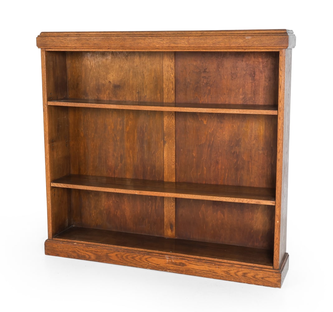 ANTIQUE SCANDINAVIAN OAK BOOKCASE: Bookcase with carved details. In oak. Dimensions: H 53" x W 56.5" x D 11.25" Condition: Wear consistent with age and use. Nicks, scuffs, minor dings to edges. Round mark to top. Some soiling to bottom