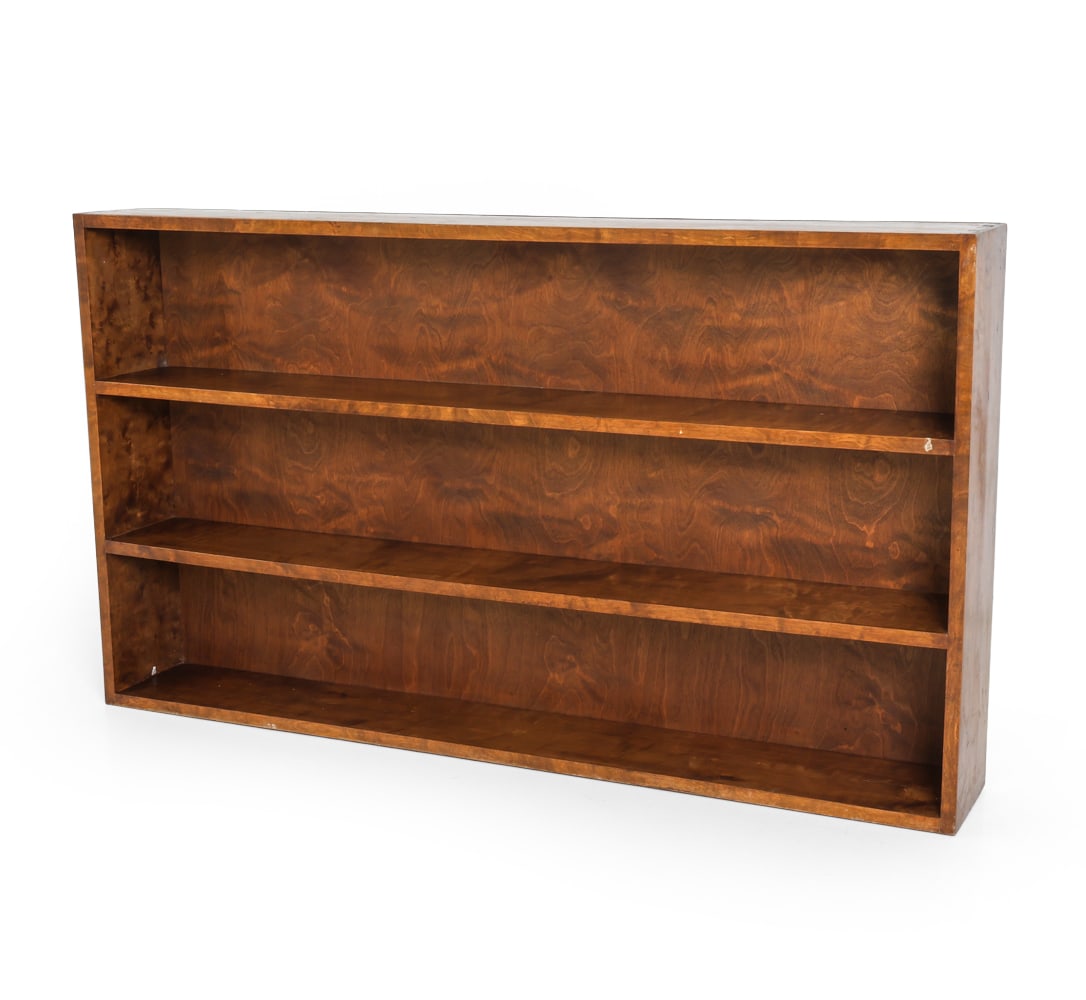 ART DECO BIRCH BOOKSHELF C. 1930S: Dimensions: H 33.25" x W 58.75" x D 7.75" Condition: Ding to front side of shelves. Wear consistent with age and use. Scratches. DA_177