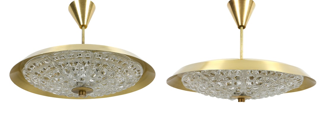 CARL FAGERLUND FOR ORREFORS SWEDISH PENDANT LAMPS: Two total. Model Stella. Brass and glass shade. Apparently unmarked. Sweden, circa 1970s. Dimensions: H 6.5" x Dia. 17.5". Condition: Wiring untested. Finish loss and scratches. DA_89