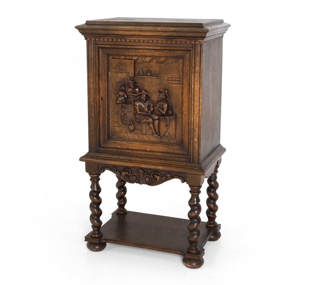 BAROQUE STYLE DANISH CARVED OAK CABINET C. 1930S: Key included. Oak cabinet with an internal shelf. Barley twist legs connected by a lower shelf. Denmark, circa 1930s. Dimensions: H 42" x W 23.25" x D 16" Condition: Hole to internal shelf. Scuffs.