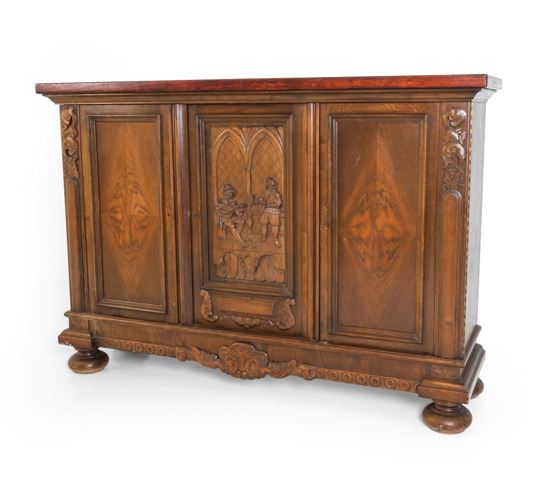 BAROQUE STYLE DANISH CARVED OAK SIDEBOARD C. 1930S: Two keys included. Oak cabinet with carved panels. On turned bun feet. Denmark, circa 1930s. Dimensions: H 49.5" x W 79.5" x D 19" Condition: Wear consistent with age and use. Soiling and scuffs.