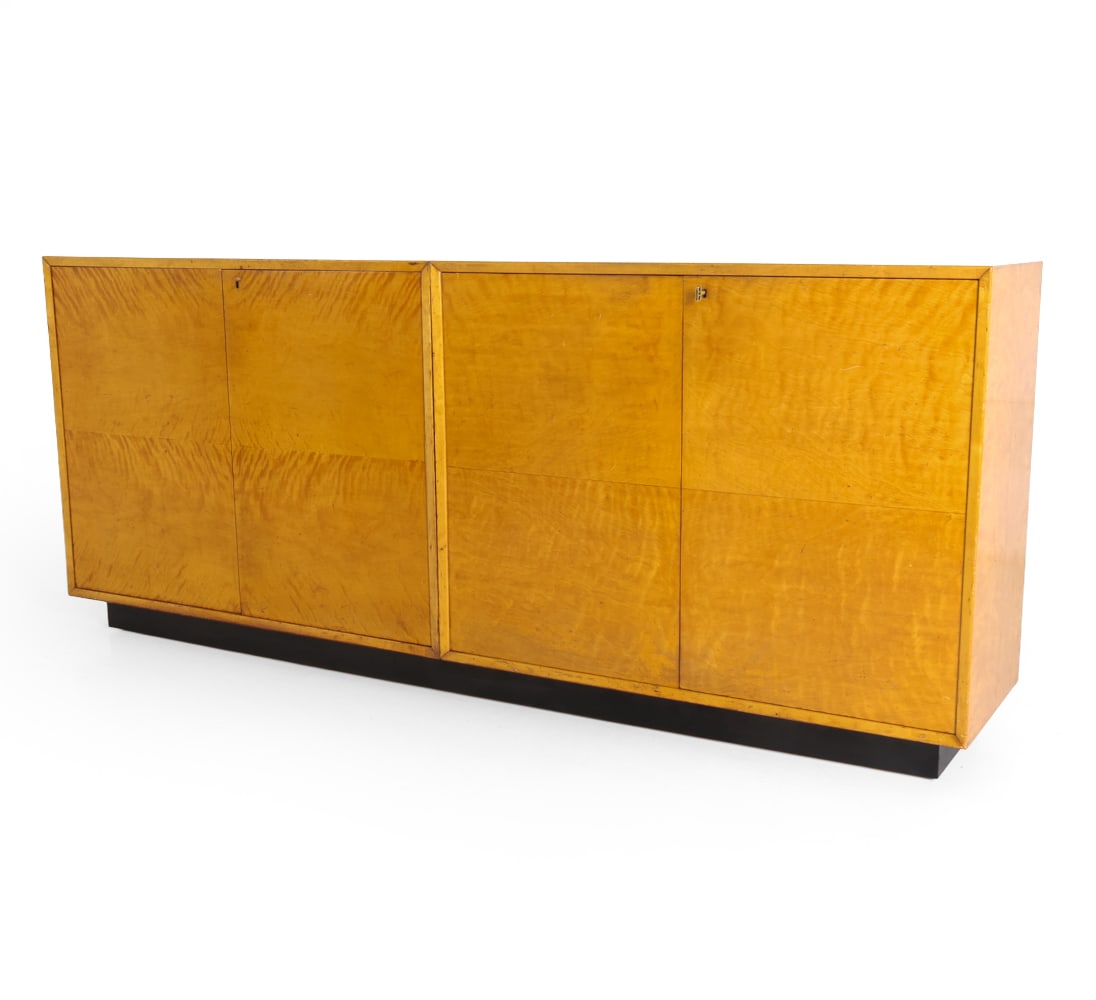 AB J. O. CARLSSONS SWEDISH BIRCH SIDEBOARD 1960S: Marked to frame. Key included. Constructed in joined sections with interior screw. Sweden, circa 1960s. Dimensions: H 33" x W 79" x D 15.5". Condition: Scratches, scuffs, and dings. Holes cut out to b