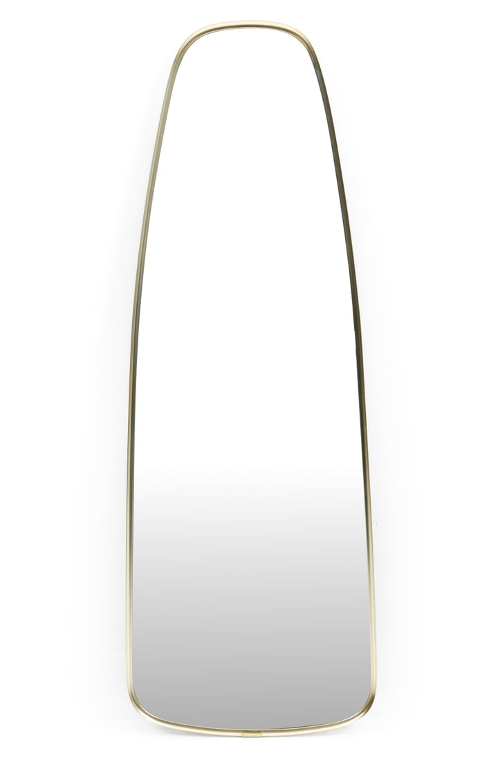 SWEDISH MID-CENTURY BRASS WALL MIRROR: Brass frame wall mirror with rounded shape. Mid-20th century. Dimensions: H 40.25" x W 12.5". Condition: Light scuffs and rubs to frame. Wear consistent with age and use.
